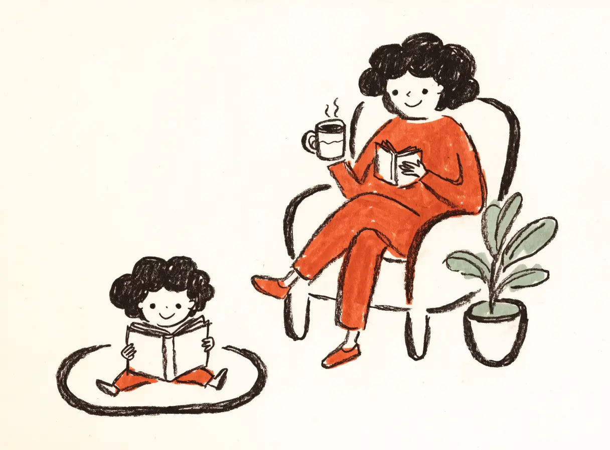Illustration of a parent reading in an armchair while their child reads nearby on the rug.